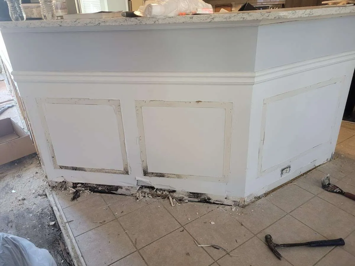 Water damage and mold on kitchen during Storm Damage Restoration in Granby